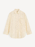 By Malene Birger Derris Voile tynn bomullsskjorte med polkadotter, oversized passform og knapper i front.