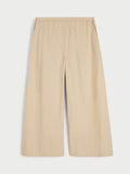 Luisa bukse i beige 100% organisk bomull med cropped lengde, vide ben og lett, luftig passform.
