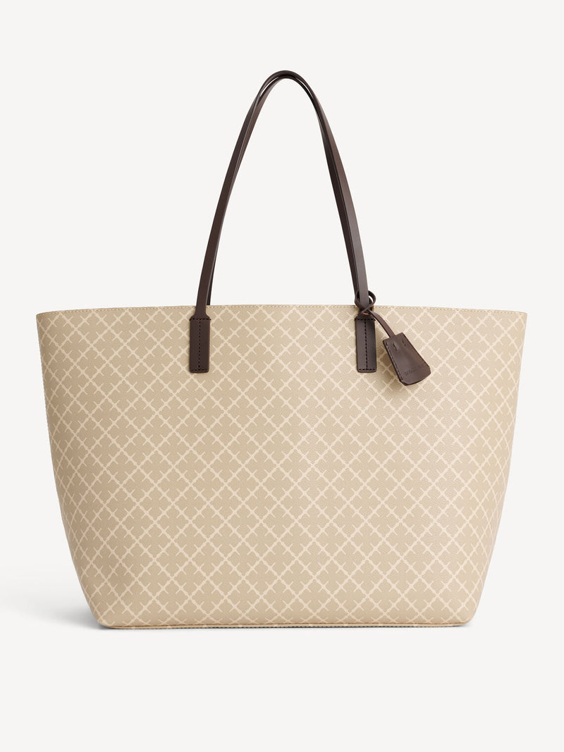 By Malene Birger Abi Tote veske i beige Signature Flower-print, med skinndetaljer og romslig design.
