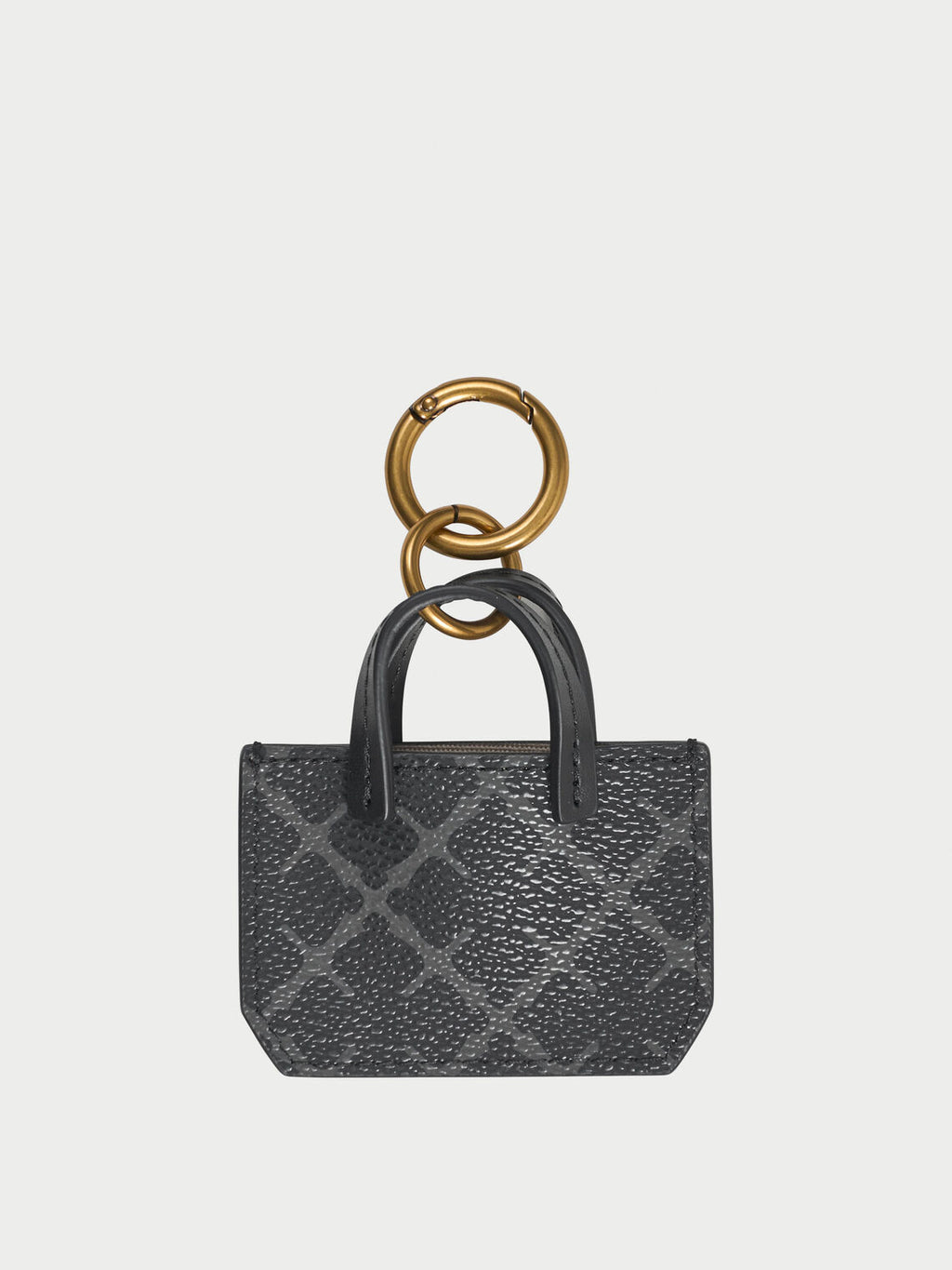 ADA CHARM nøkkelring fra By Malene Birger i fargen grå, med Signature Flower-print.