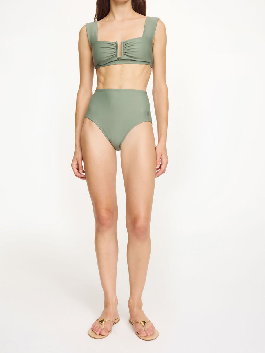 BELIRA bikinitruse fra By Malene Birger i grønn. Laget i resirkulert polyamide og elastane. Høyt liv og flatterende passform.