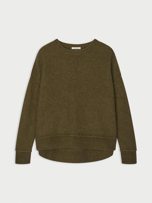 BIAGIORMS genser fra By Malene Birger i fargen mørkegrønn, laget i mohair.