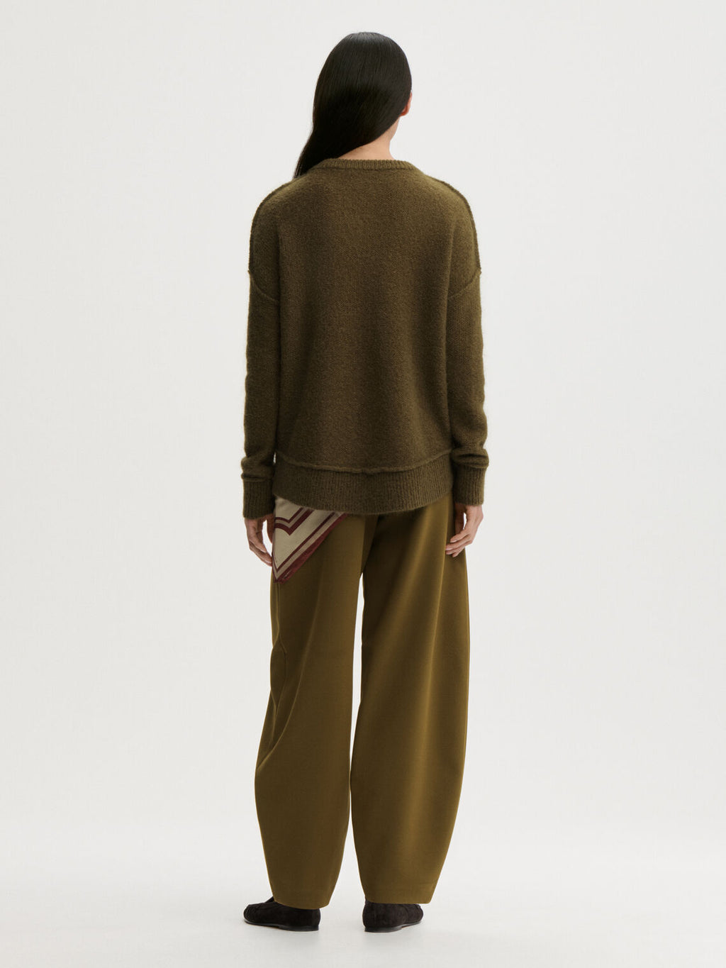 BIAGIORMS genser fra By Malene Birger i fargen mørkegrønn, laget i mohair.