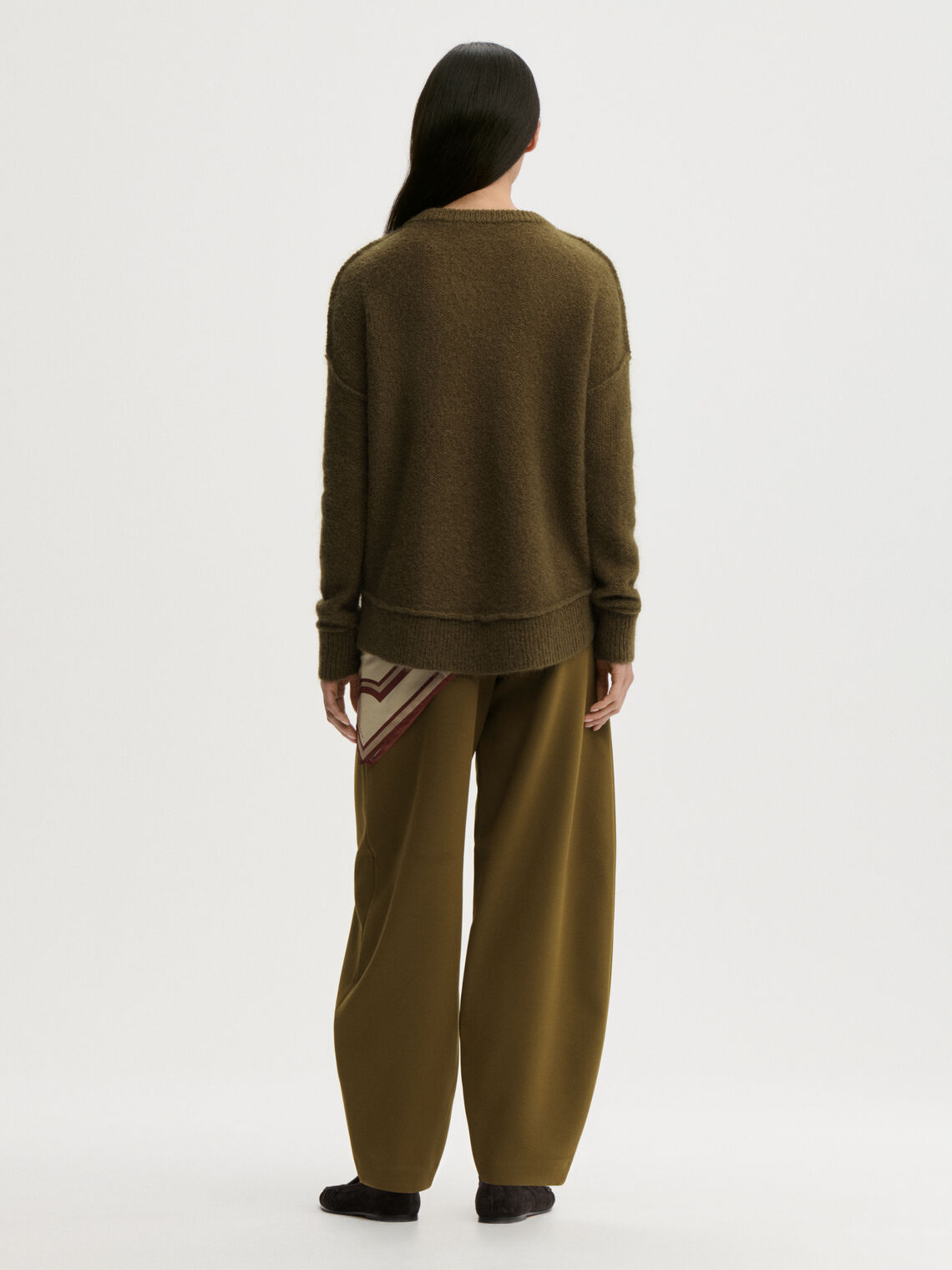 BIAGIORMS genser fra By Malene Birger i fargen mørkegrønn, laget i mohair.
