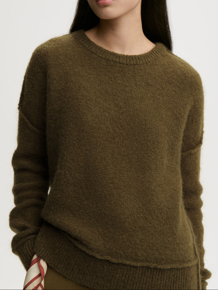 BIAGIORMS genser fra By Malene Birger i fargen mørkegrønn, laget i mohair.