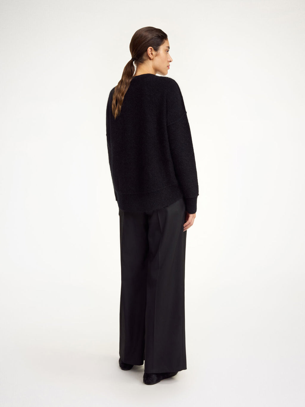 By Malene Birger Biagorms genser i sort mohair og ull, med oversized passform og vrengte sømmer.