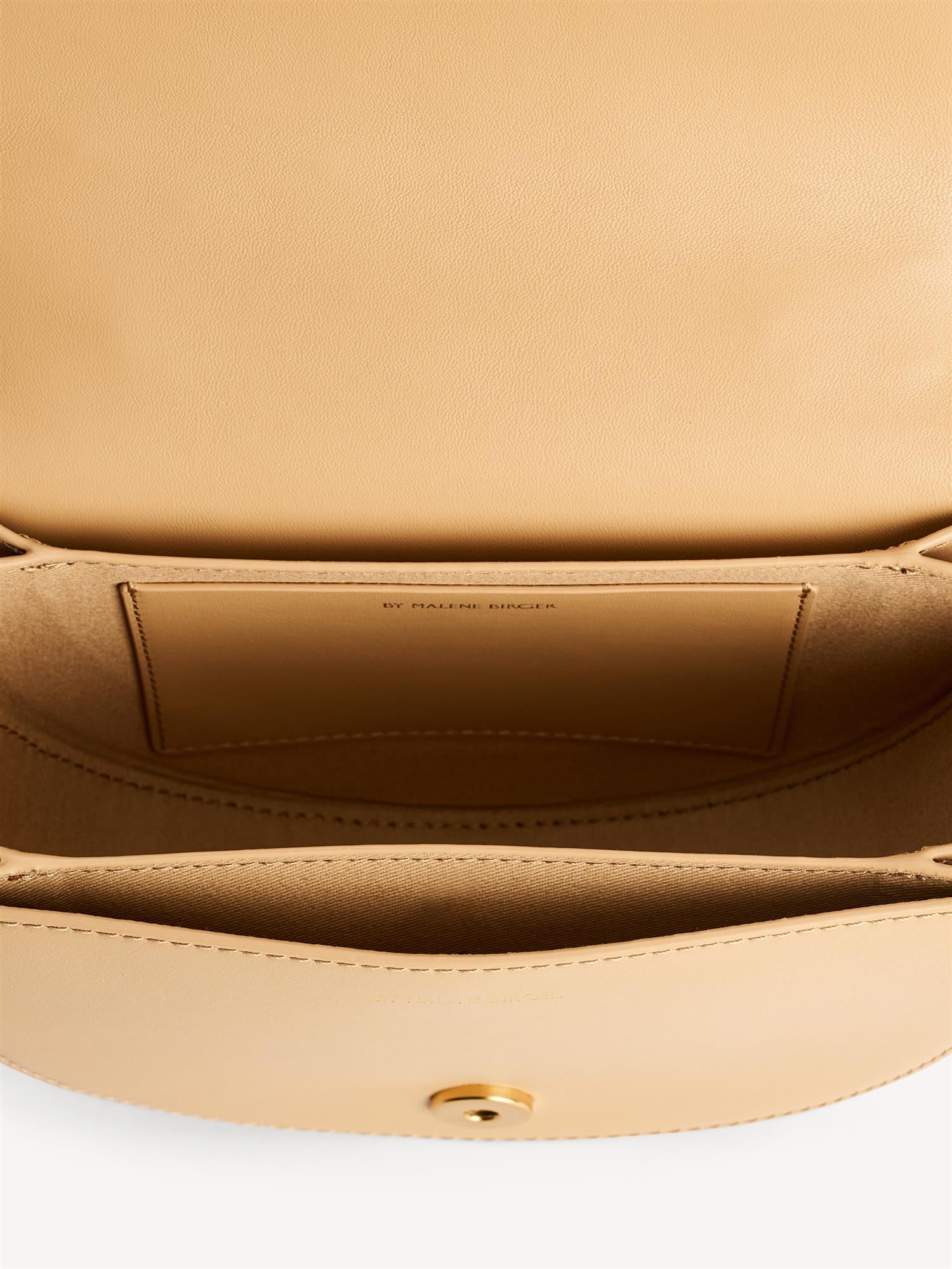 CEBELLI STONE veske fra By Malene Birger i fargen beige, med hank og strassdetaljer.
