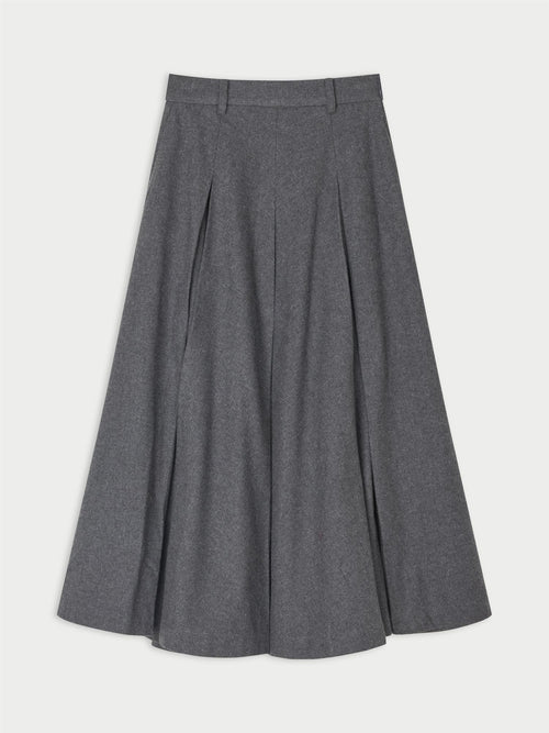 EDEN skjørt fra By Malene Birger i fargen mørkegrå, laget i 100% bomull (flanell). A-formet silhuett med lommer i siden og glidelås i siden.