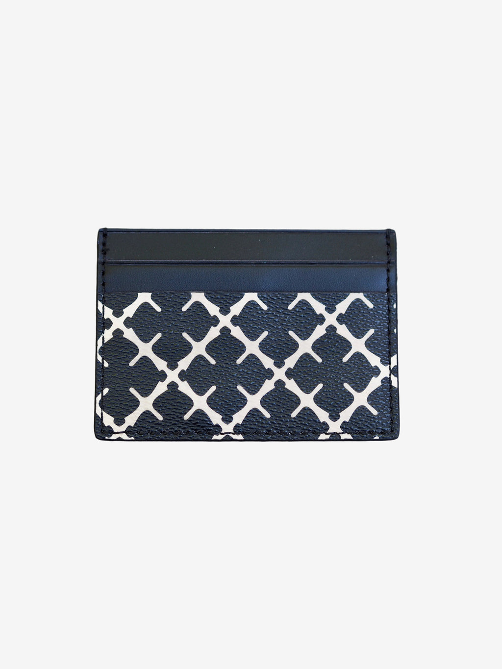 By Malene Birger Elia Card kortholder i sort, laget av 100% polyvinylklorid, med Signature Flower-print og plass til flere kort.