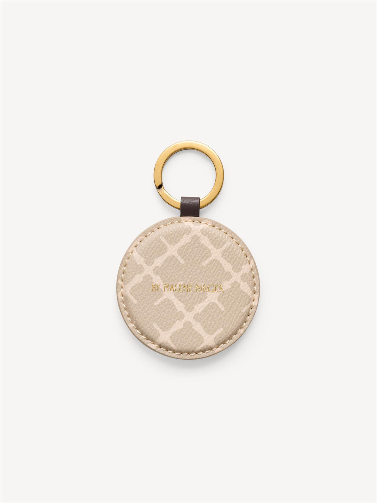 ELIA KEY nøkkelring fra By Malene Birger i beige polyvinyl chloride med Signature Flower-print, gullfargede metalldetaljer og logo.