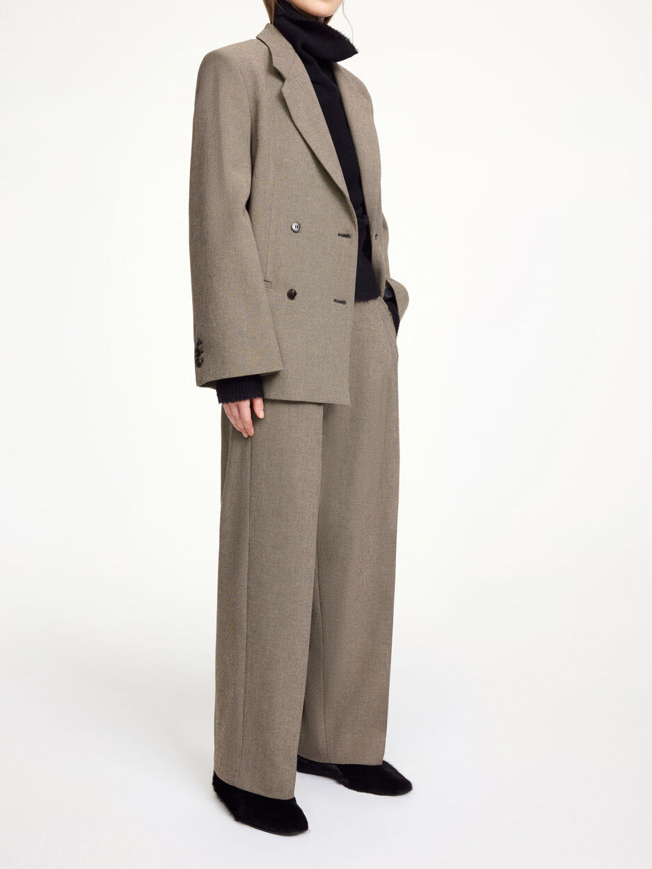 By Malene Birger Elsa dressbukse i brun, med en stilig melering og struktur, laget av polyester, viskose og elastan.