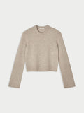 HANNAH genser fra By Malene Birger i fargen beige, laget i 100% ull. Kort, cropped lengde med rund hals og ribbestrikket avslutning.