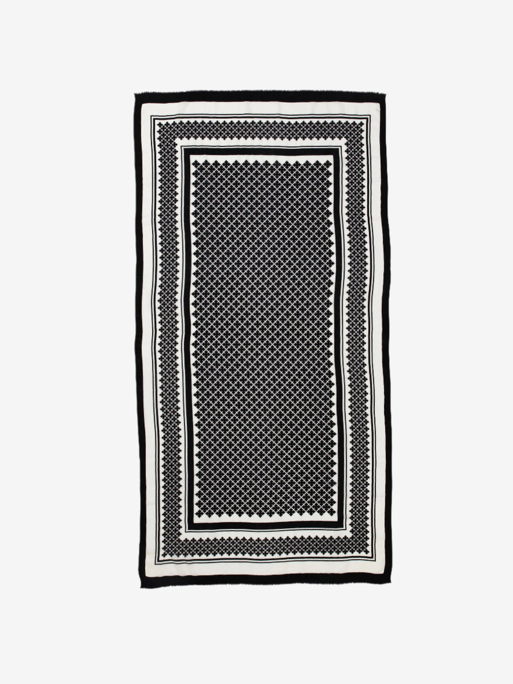 By Malene Birger Julee skjerf i lett og fin ull, med Signature Flower-mønster i sort.