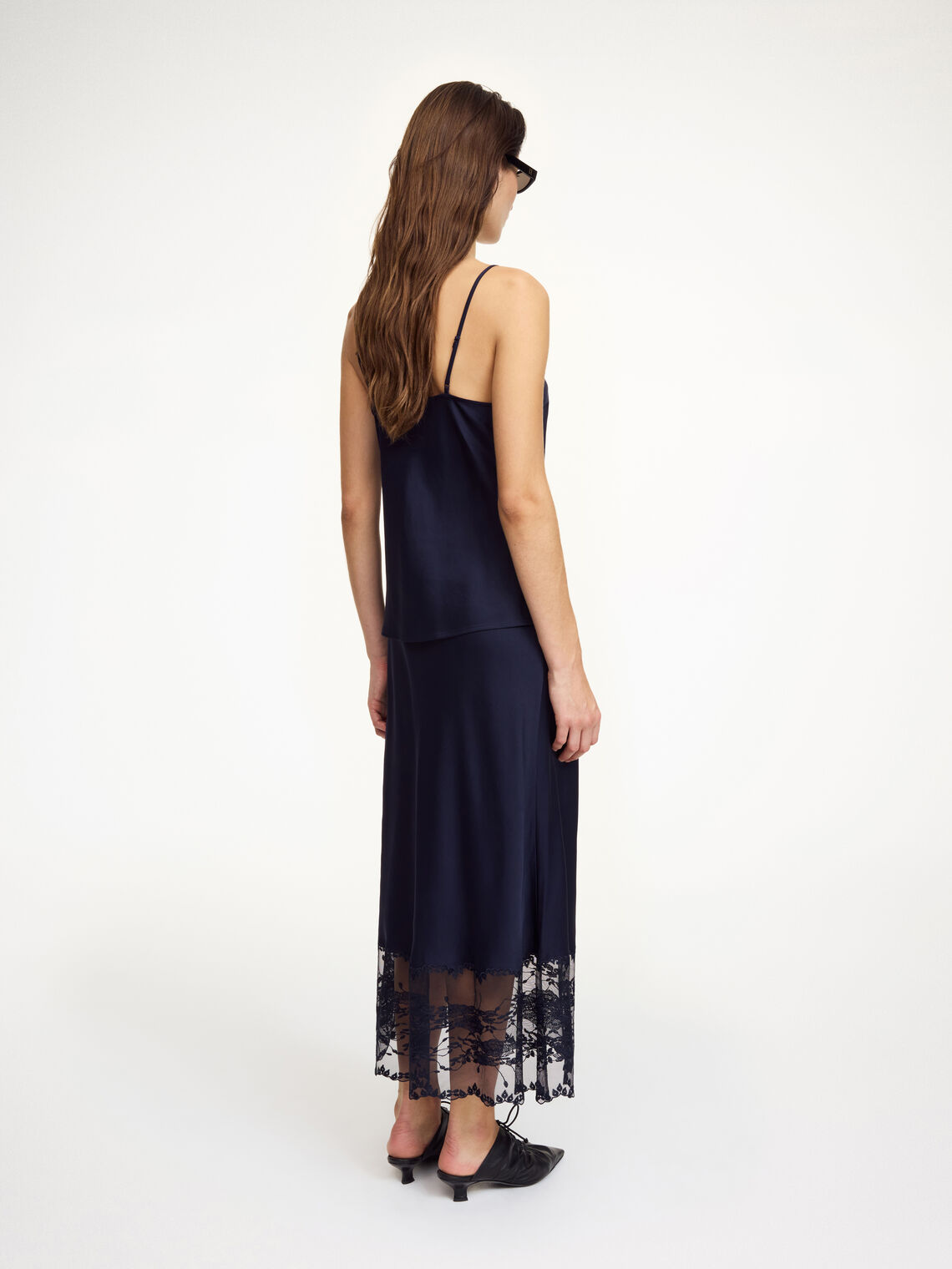 Mørkeblå topp med blonder i acetat og polyester, feminine detaljer, elegant og sensuelt uttrykk