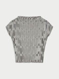 LIANNA plissebluse fra By Malene Birger i fargen sølv, laget i 100% resirkulert polyester. Båthals, dropped skuldre og en avslappet, flatterende passform.