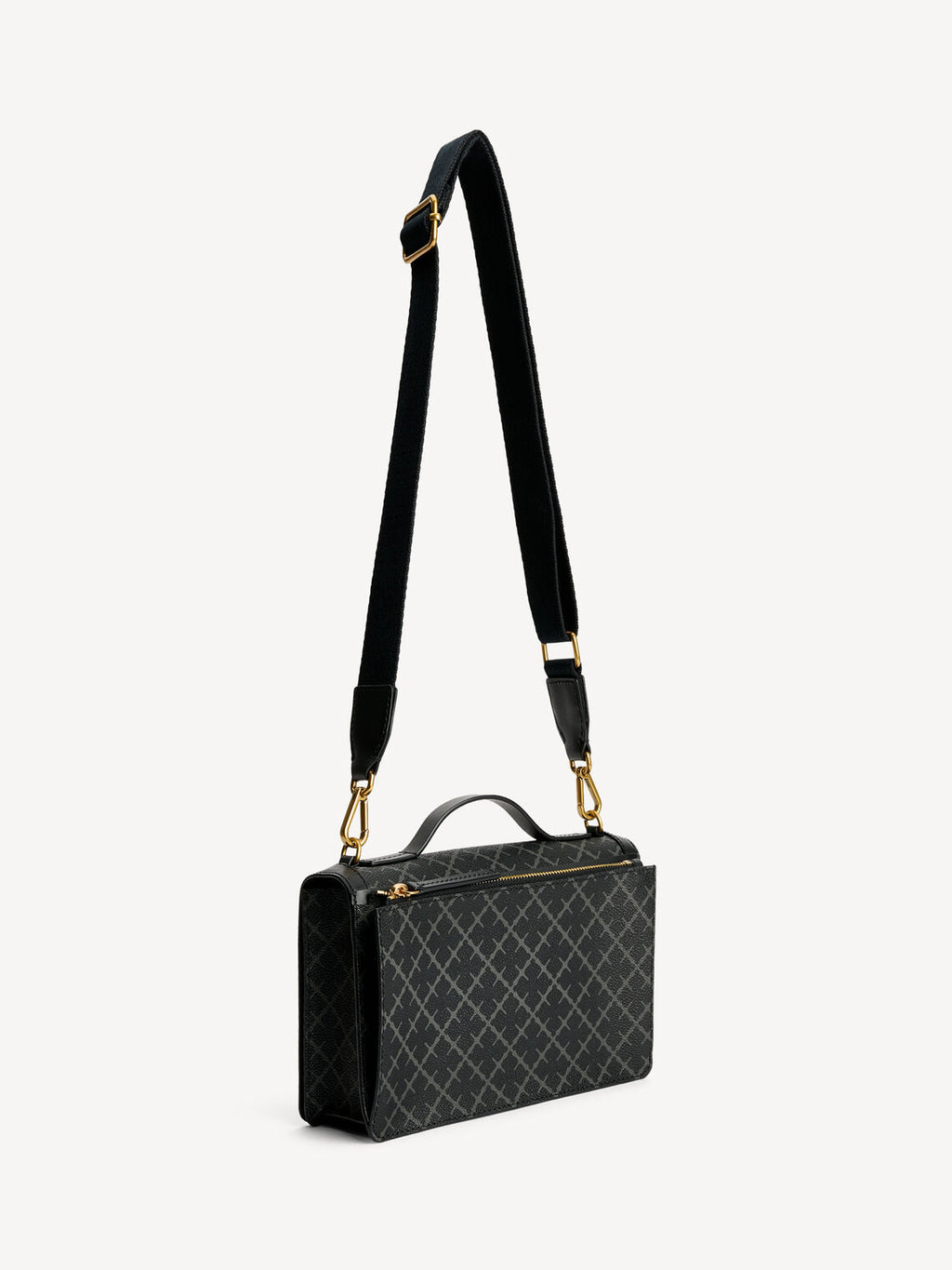 LOENNAS cross-over veske fra By Malene Birger i fargen grå, laget i PVC med skinndetaljer. Sett fra siden.