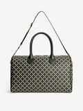 LULLU LARGE weekendbag fra By Malene Birger i fargen sort, laget i polyvinylklorid med Signatur Flower-print, avtagbar skulderreim og brede bærehåndtak.