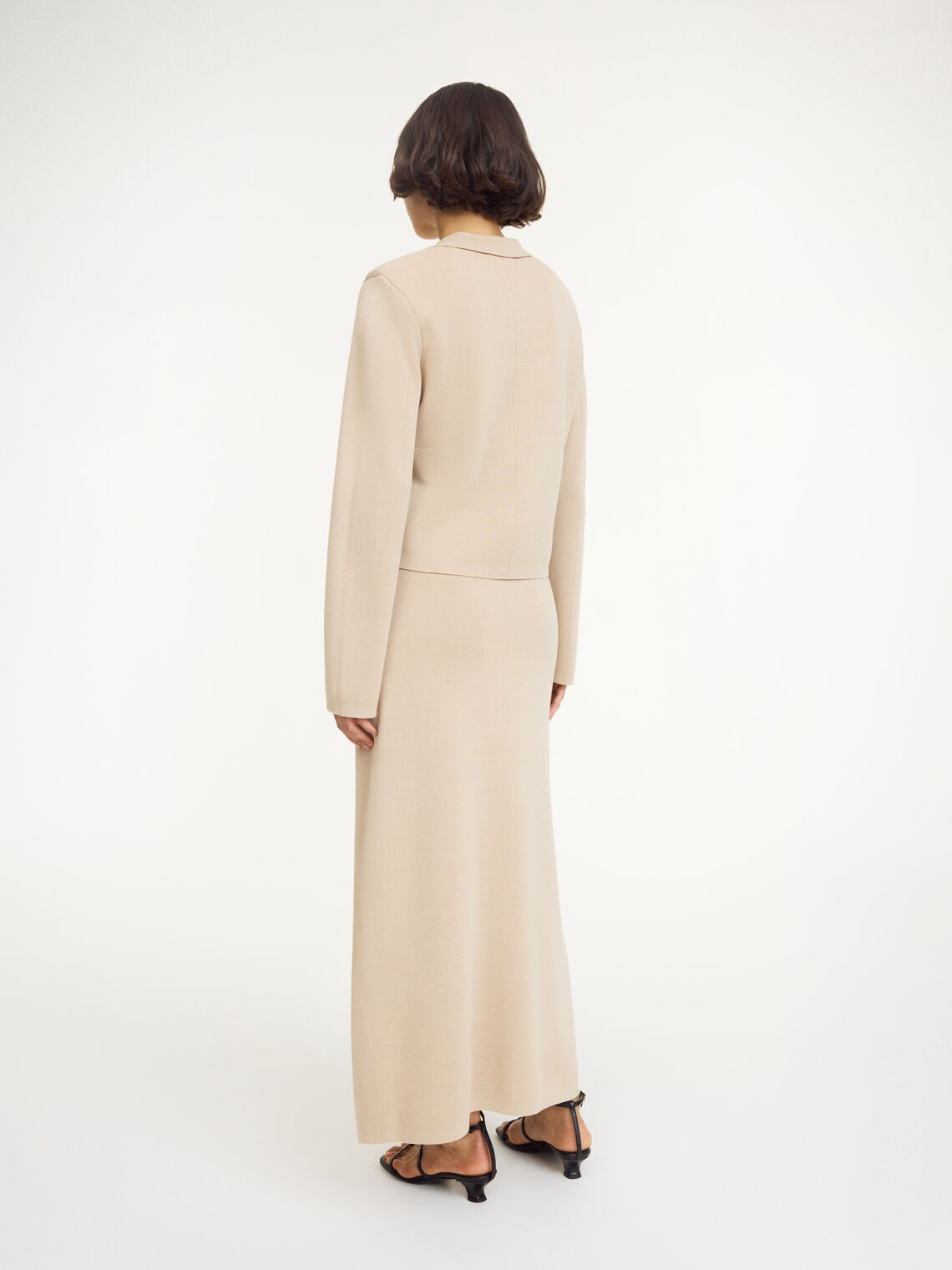 By Malene Birger Roz strikket skjørt i beige, laget av viskose og polyamid, med en nett a-formet passform og strikk i livet.