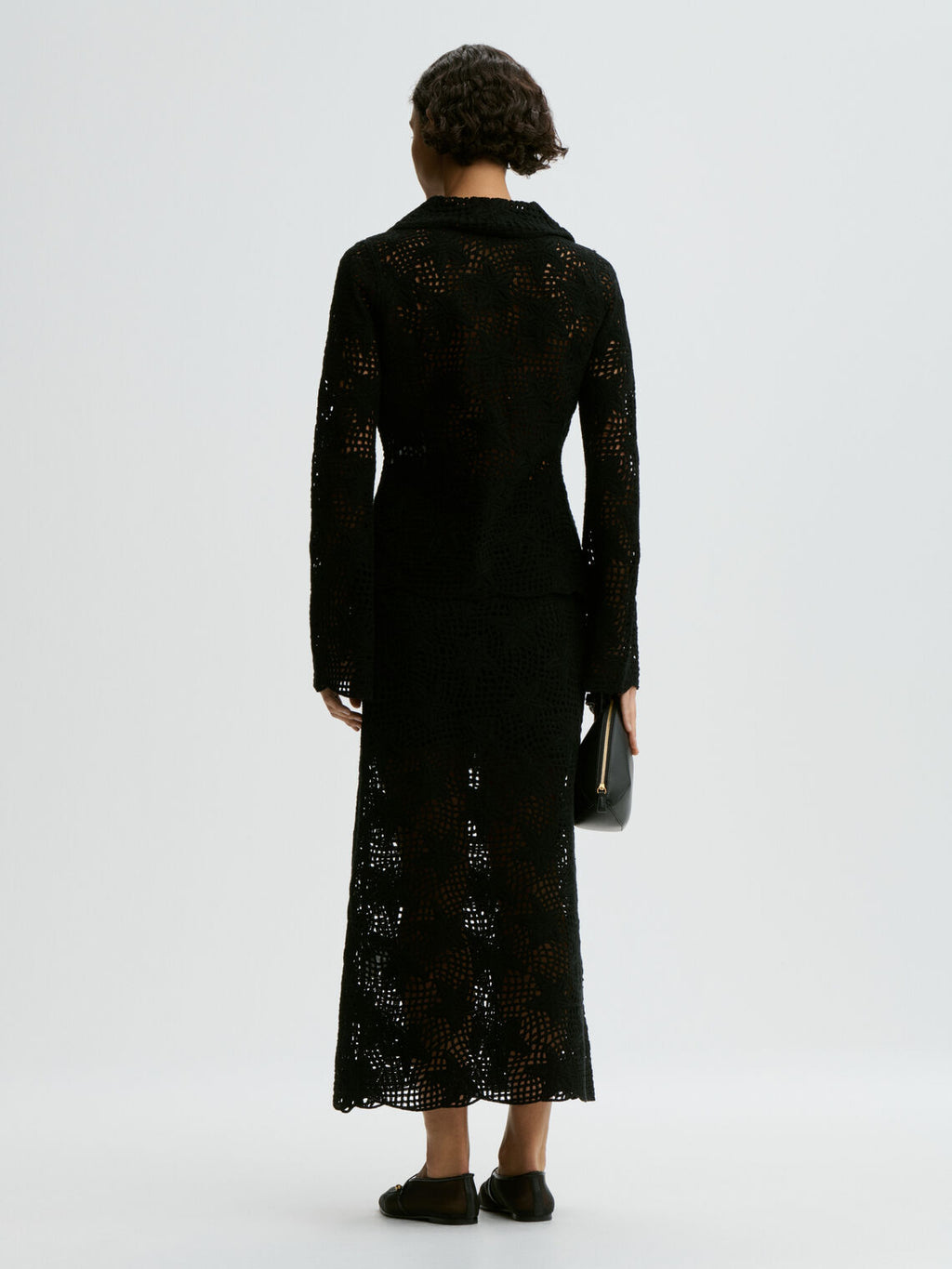 By Malene Birger Roz skjørt i sort, laget av 100% organisk bomull. Klassisk og allsidig design.