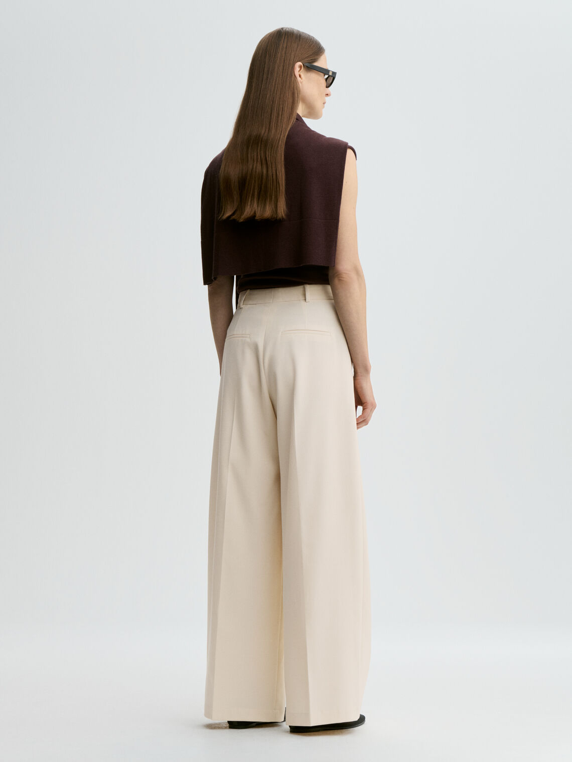 TAALIA bukse fra By Malene Birger i fargen kremhvit, med vide ben.