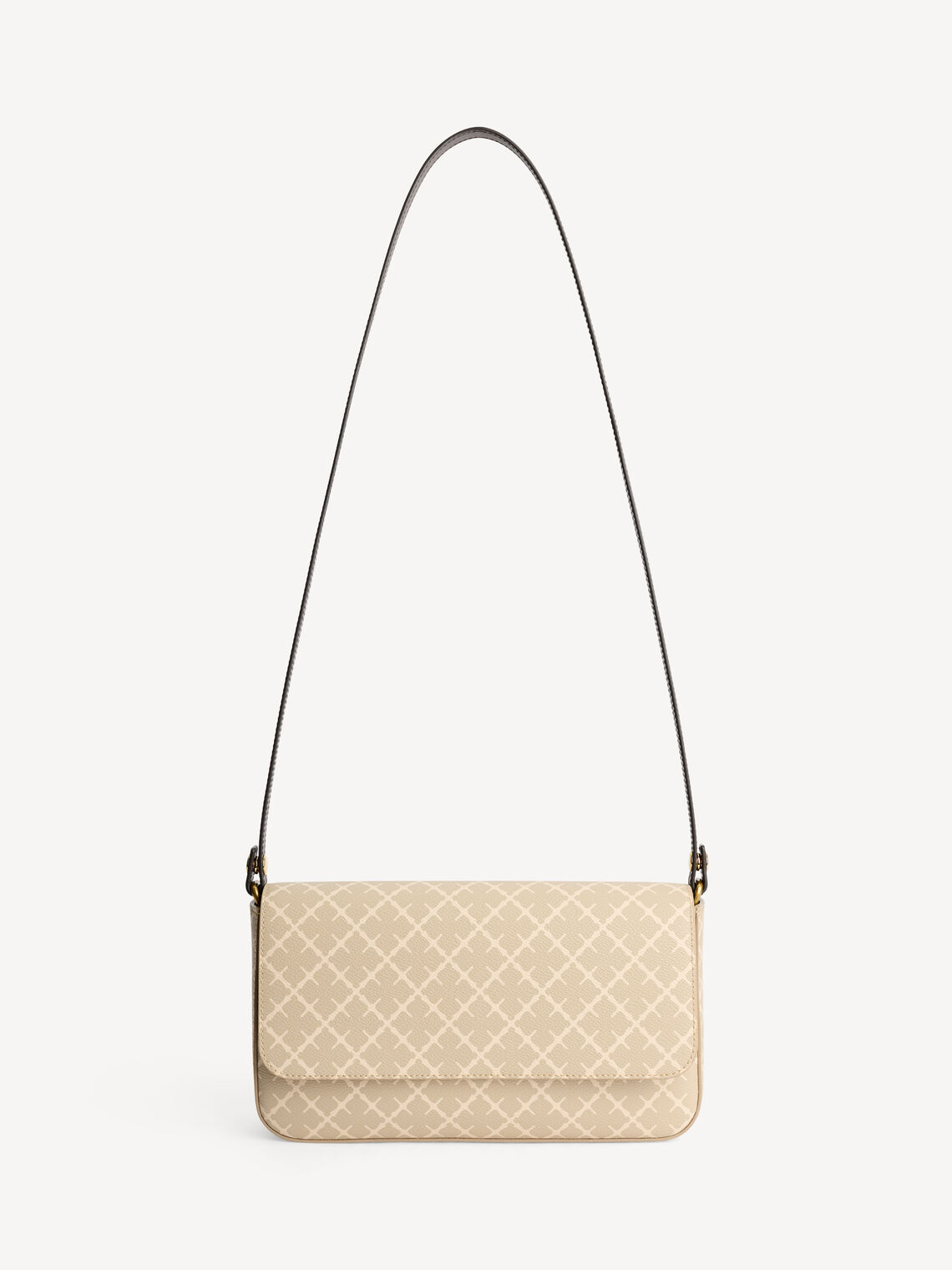 TALLIE veske fra By Malene Birger i fargen beige, laget i polyvinylklorid med Signatur Flower-print. Magnetknapp, avtagbar reim i to lengder og innvendig lomme.