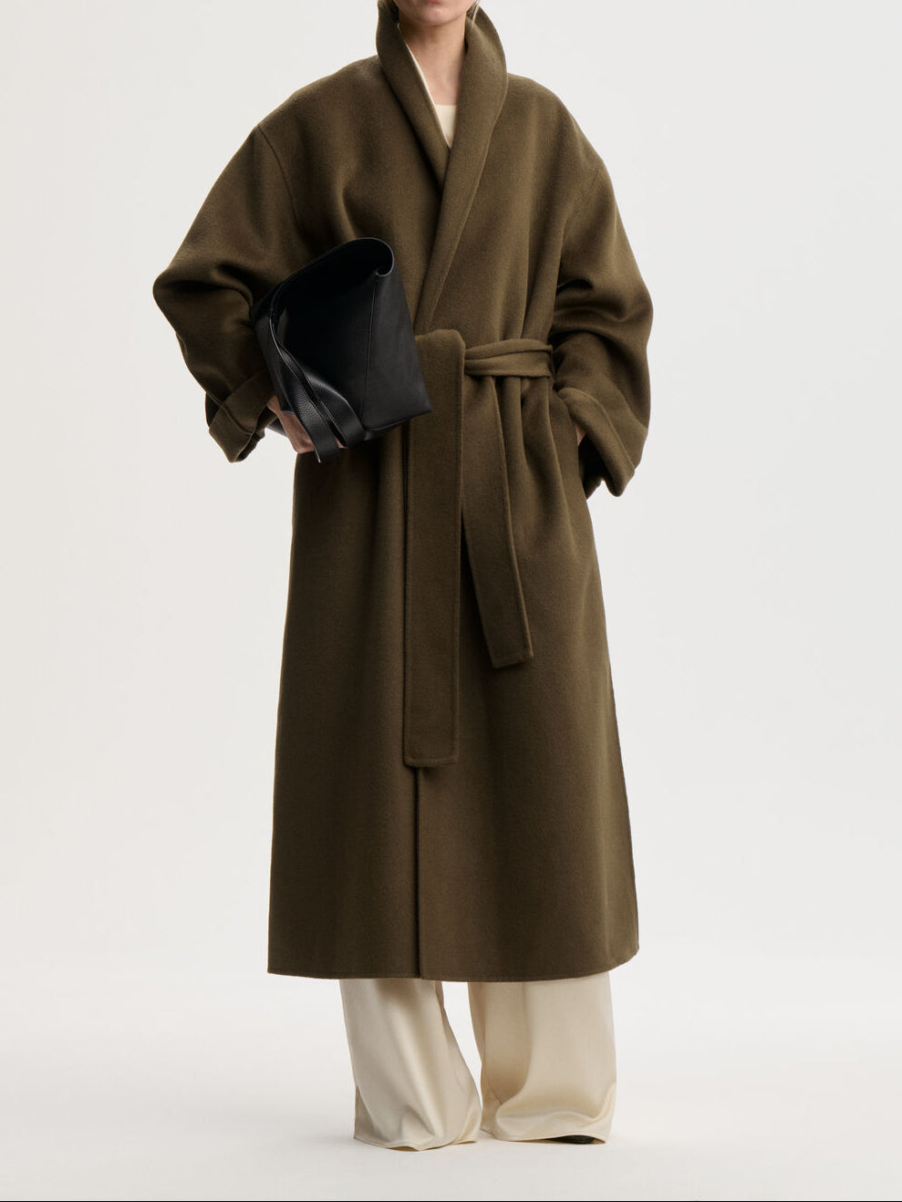 TRULLEM kåpe fra By Malene Birger i fargen mørkegrønn, laget i 100% ull.