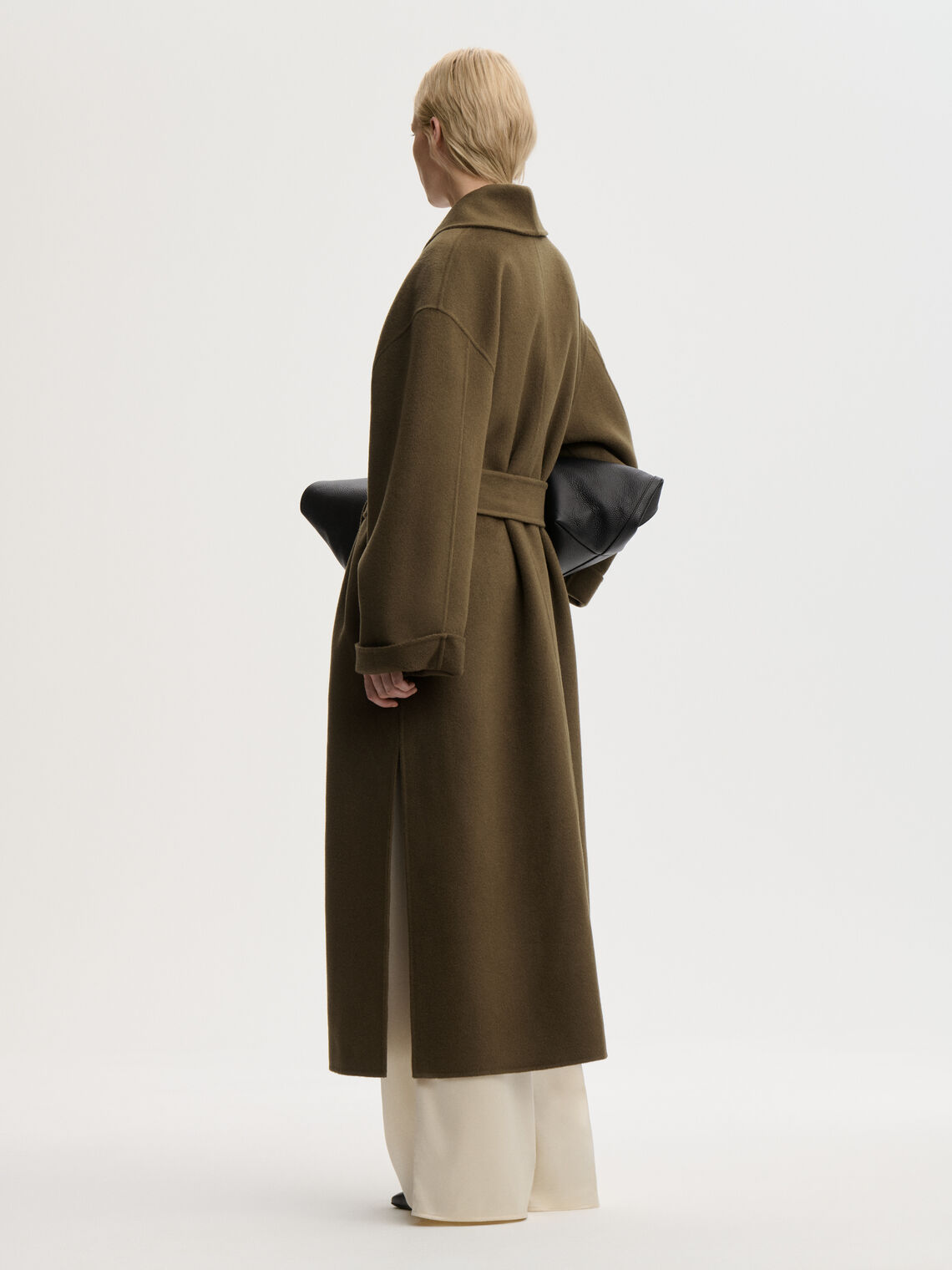 TRULLEM kåpe fra By Malene Birger i fargen mørkegrønn, laget i 100% ull.