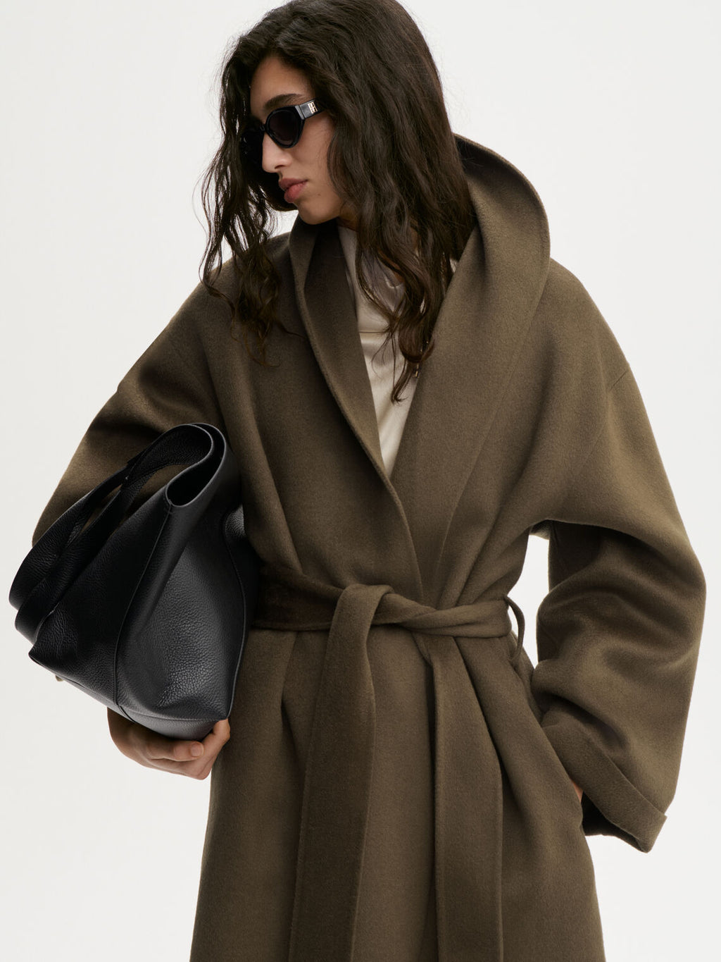 TRULLEM kåpe fra By Malene Birger i fargen mørkegrønn, laget i 100% ull.
