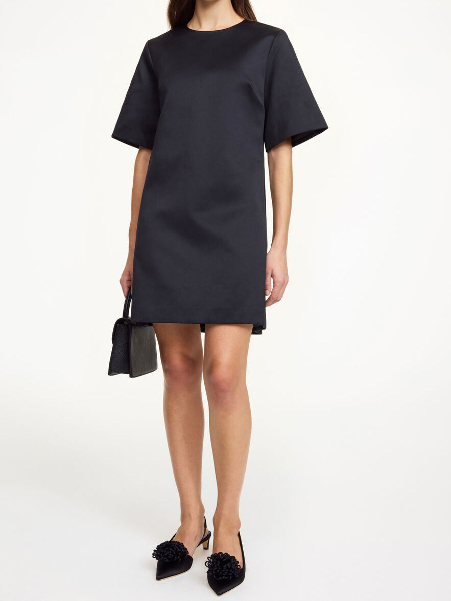 By Malene Birger Harperz minikjole i sort polyester og bomull med rund hals, lange ermer og skjulte lommer.