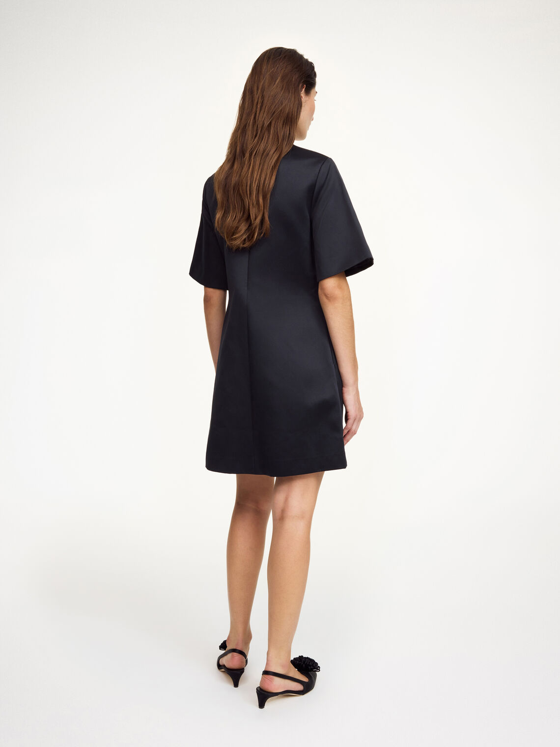 By Malene Birger Harperz minikjole i sort polyester og bomull med rund hals, lange ermer og skjulte lommer.