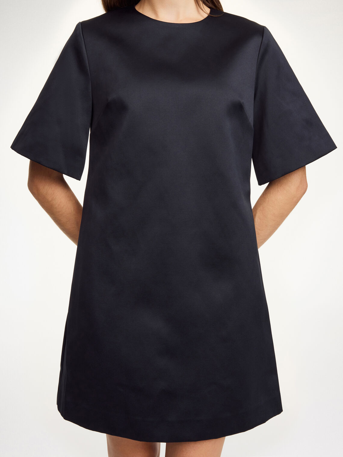 By Malene Birger Harperz minikjole i sort polyester og bomull med rund hals, lange ermer og skjulte lommer.