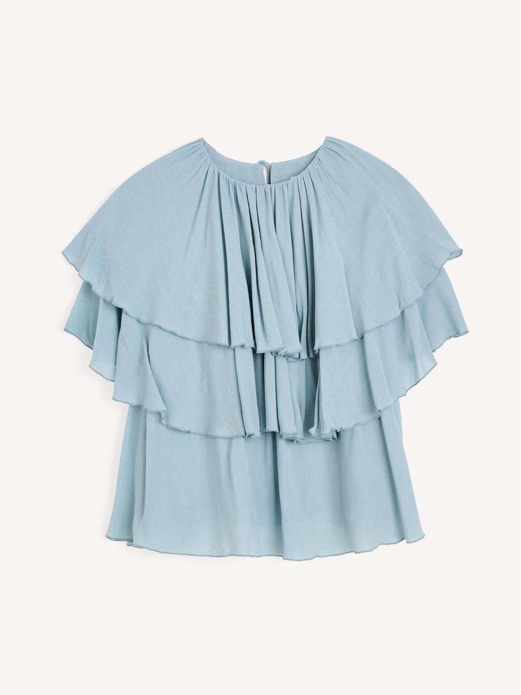 Lyseblå NINA chiffon bluse fra By Malene Birger i viskose, flerelags og halvtransparent med strikk i livet og maxi lengde.
