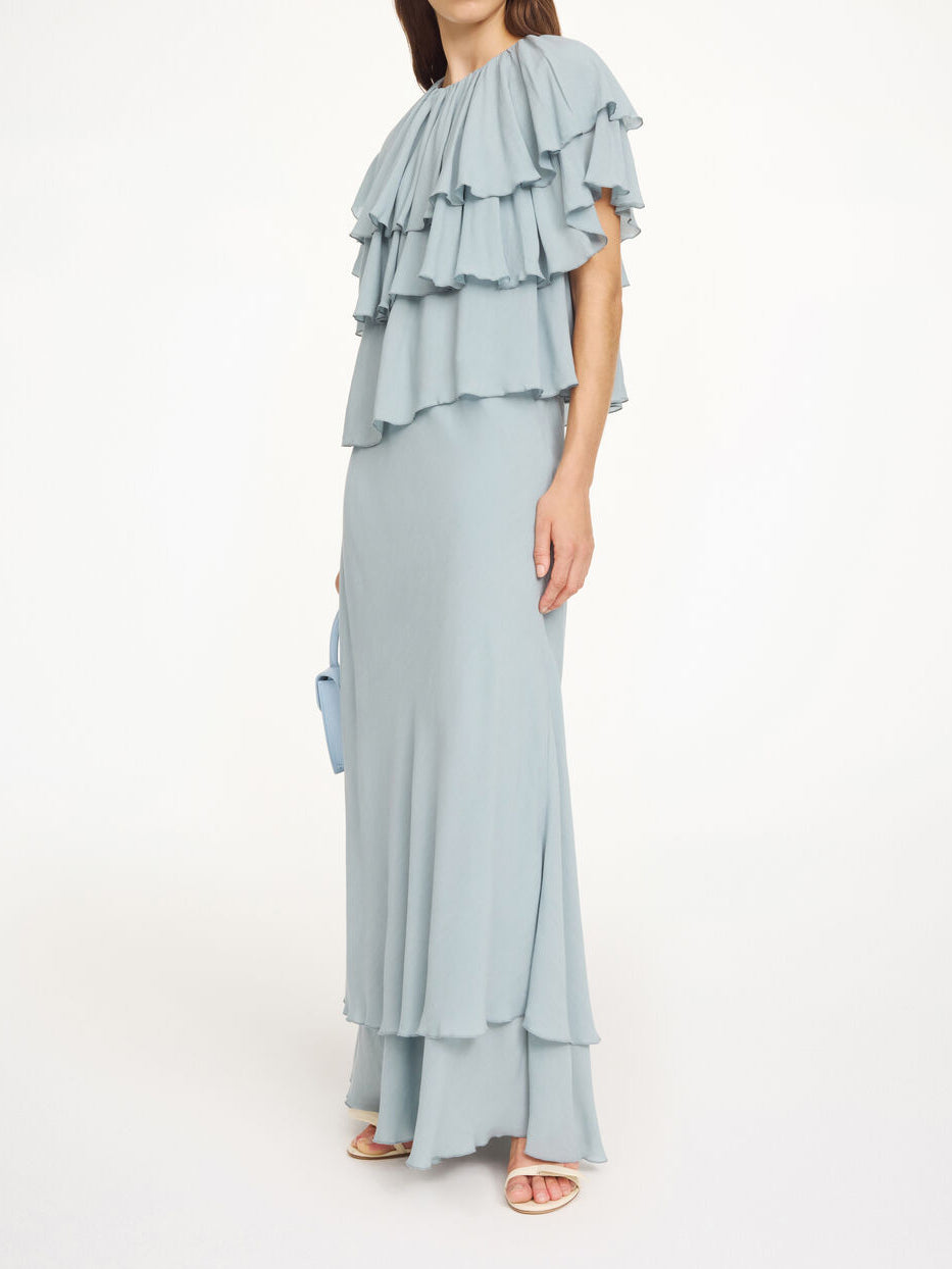 Lyseblå NINA bluse fra By Malene Birger sett forfra, løs passform med strikk i livet.