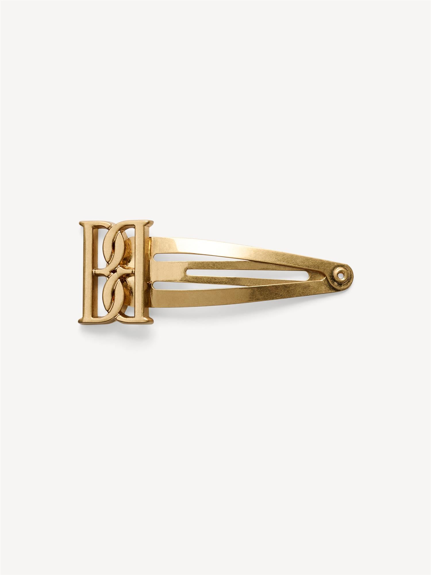 By Malene Birger NOLLO hårspenner i gullfarget sink med monogramprint, 5,5 cm x 2 cm, 2-pk