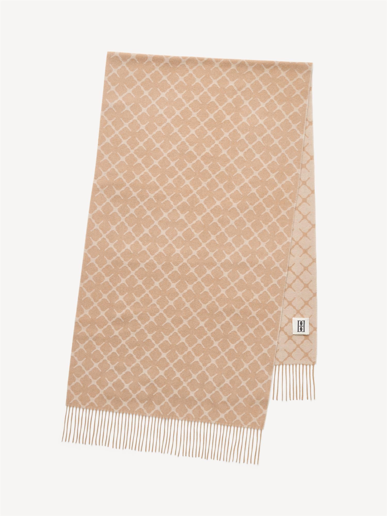 By Malene Birger ORTEGA ullskjerf i beige ull og kasjmir. Myk og varm tekstur med klassisk ensfarget design.