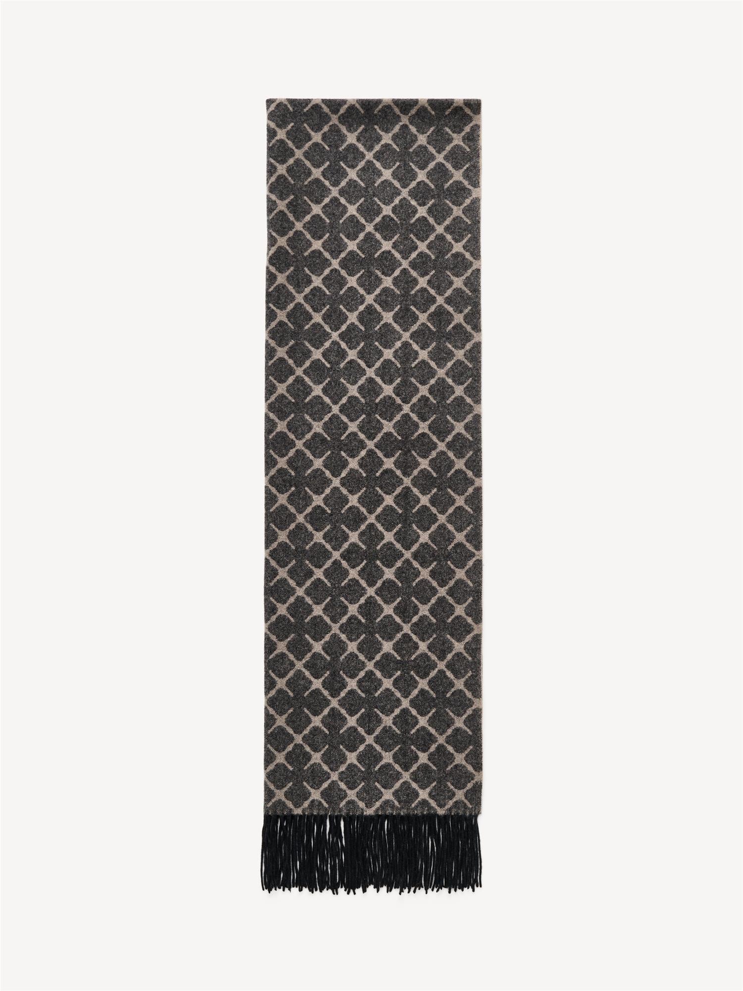 By Malene Birger ORTEGA ullskjerf i beige og brun stripet. Myk og varm tekstur med klassisk to-farget design.