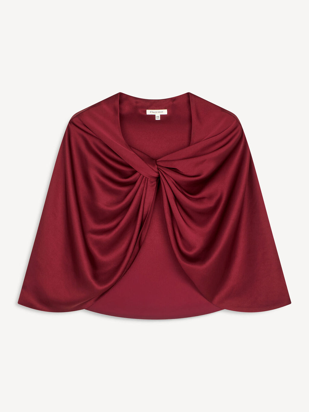 By Malene Birger PINLOS cape i burgunder materiale med Signatur Flower-print. Rund halsringning og lange fallende linjer.