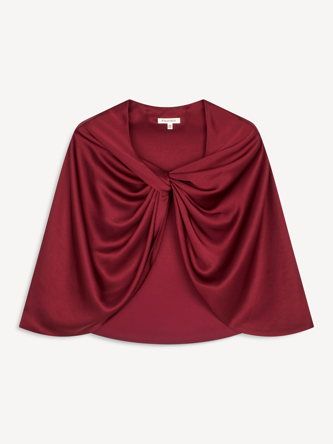 By Malene Birger PINLOS cape i burgunder materiale med Signatur Flower-print. Rund halsringning og lange fallende linjer.