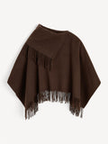 By Malene Birger TURTMA poncho i mørkebrun ull med lange frynser langs kantene. Romslig passform som kan brettes som skjerf.