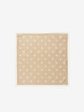 By Malene Birger Monnis silkeskjerf i lysebrun, laget av 100% silke med monogram-print.